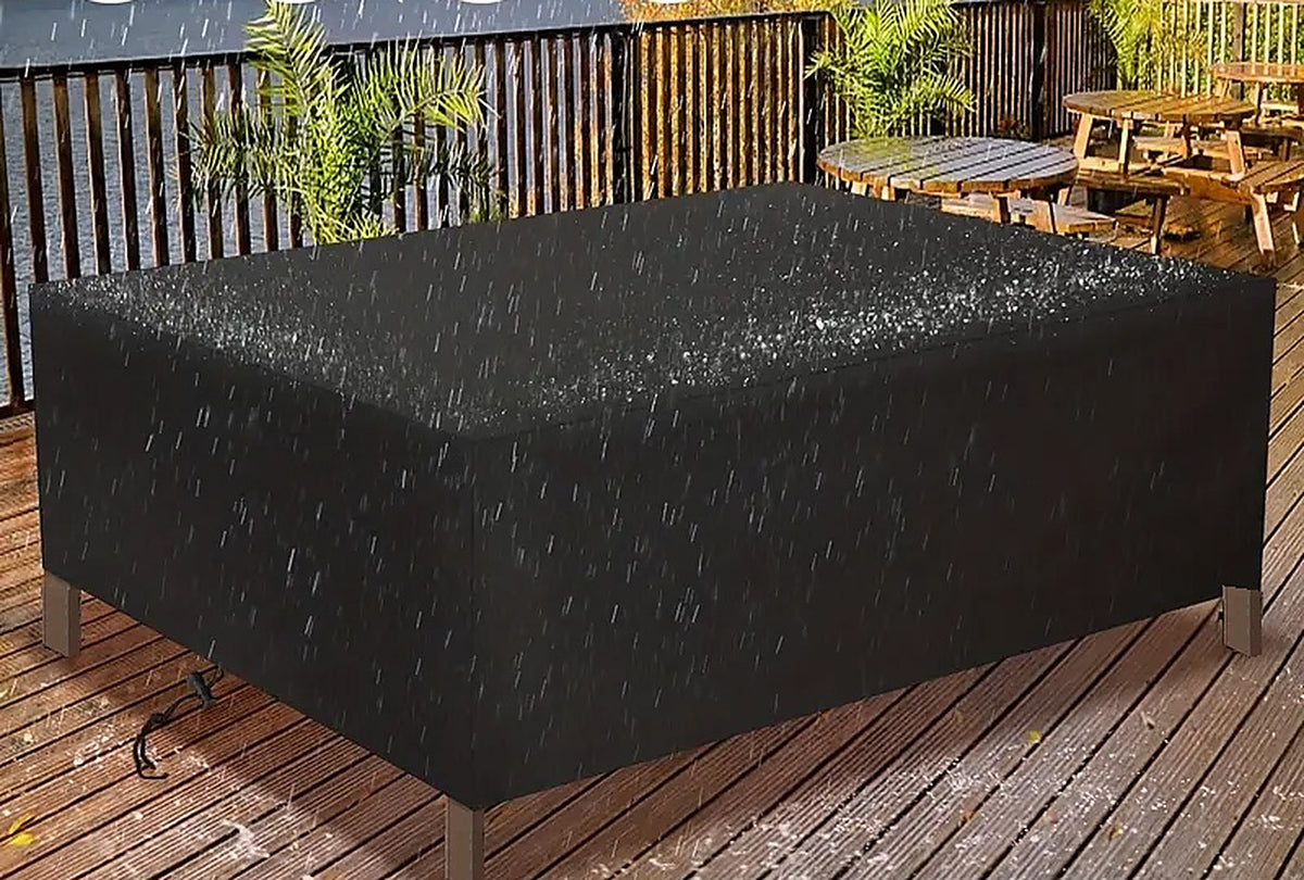 Tectra tuinmeubelhoes in een herfstbui, het water parelt op het doek en rolt eraf