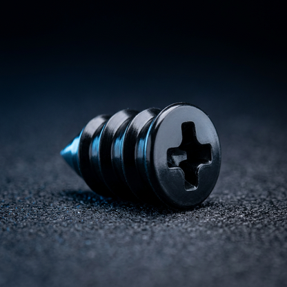 Close-up van een Vialo schroefplug met ribbels en kruiskop